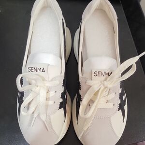 Women's Black and White Sneakers